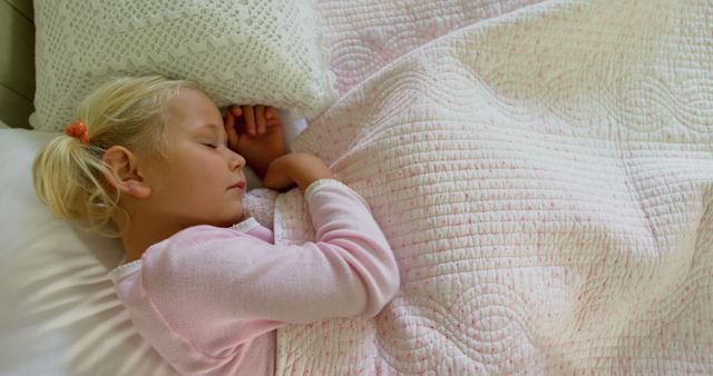 Peaceful Child Sleeping in Bed with Pink Quilt - Download Free Stock Images Pikwizard.com