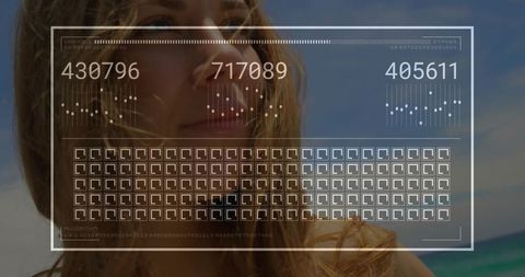 Woman Gazing Through Futuristic HUD at Seaside with Numeric Displays