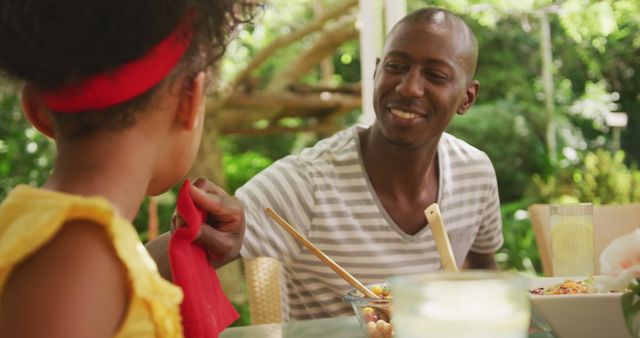 Father and Daughter Finishing Lunch Outdoors in Garden - Download Free Stock Images Pikwizard.com