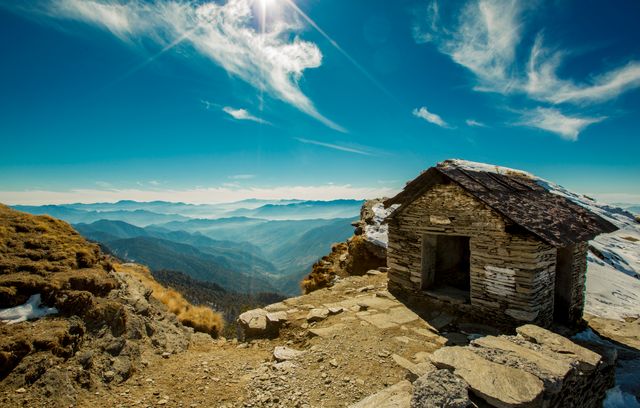 Mountain Hut with Scenic Landscape on a Sunny Day - Download Free Stock Photos Pikwizard.com