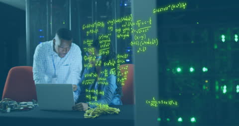 Technicians Collaborating in High-Tech Server Room