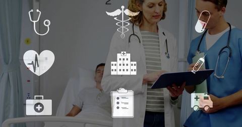 Clinicians reviewing tablet with medical icons highlighting ecg, medication and hospital care