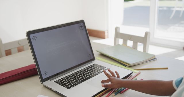 Child Engaging with Laptop on Desk with Stationery - Download Free Stock Images Pikwizard.com