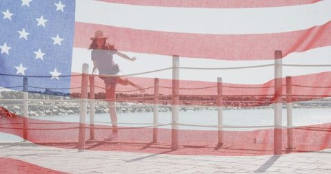 Woman Climbing Pier with American Flag Overlay