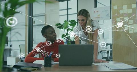 Colleagues Discussing Ideas with Digital Interface Overlay in Modern Office