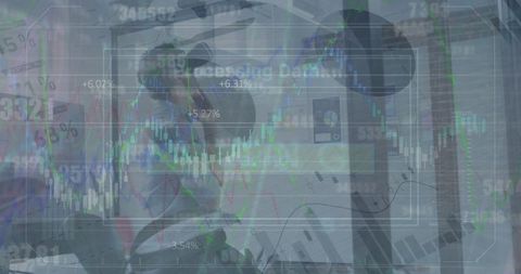 Businessman using vr headset with financial data overlay