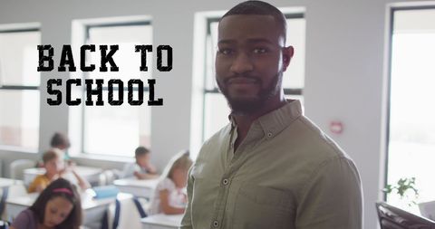 Confident Teacher Smiling with Diverse Students in Classroom - Download Free Stock Images Pikwizard.com