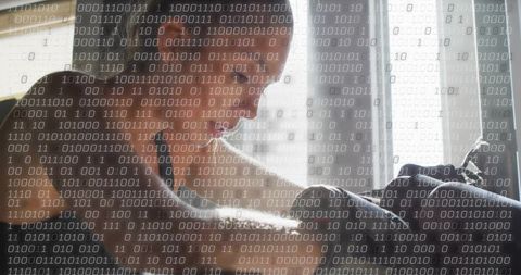 Mother cradling newborn on couch by sunlit window with binary code overlay, digital care