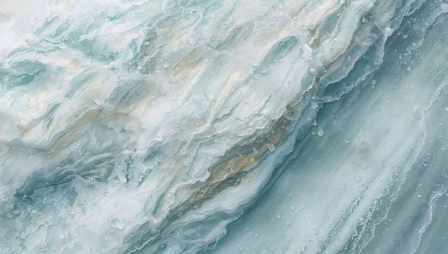 Teal and white marble slab showing translucent veins and layered onyx banding, close-up
