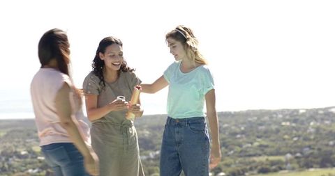 Friends Celebrating with Flare at Baby Shower Outdoors