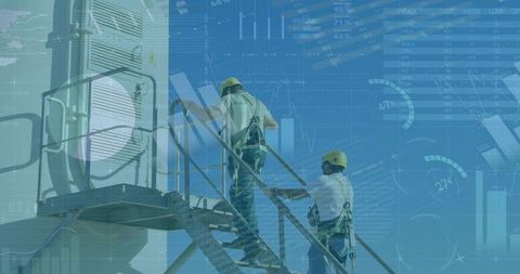 Technicians climbing industrial staircase with safety gear