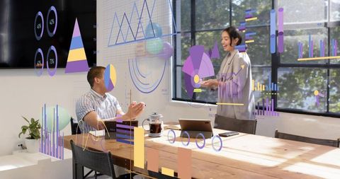 Presenting woman using interactive data visualization in bright modern meeting room