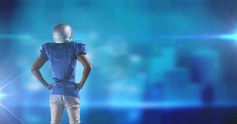 American Football Player in Dynamic Blue Light Background