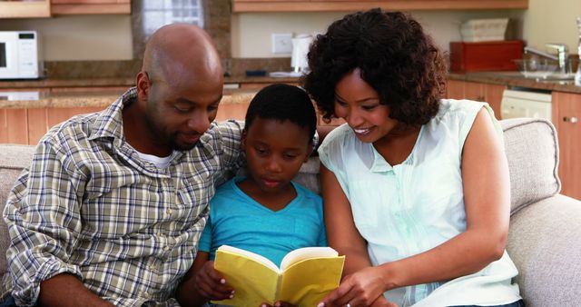 Loving African American Family Reading Storybook on Sofa - Download Free Stock Images Pikwizard.com