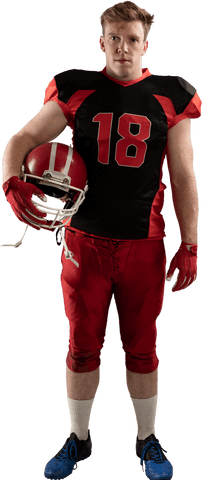 Transparent young male american football player holding helmet