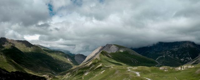 Panoramic View of Mountain Landscape with Dramatic Clouds - Download Free Stock Photos Pikwizard.com