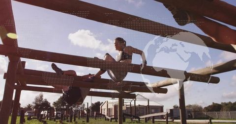 Athletes Conquering Beam Challenge at Outdoor Fitness Course