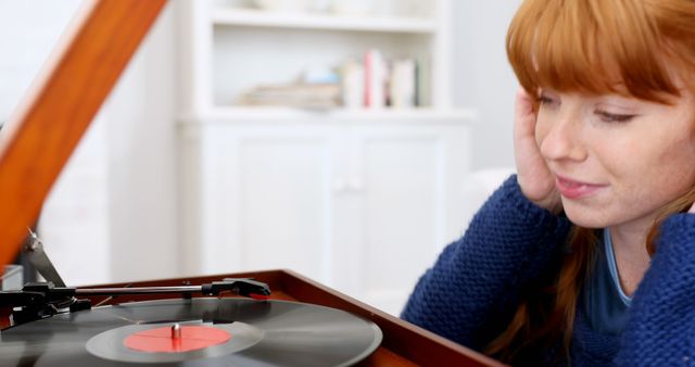 Young Woman Enjoying Music on Vintage Record Player - Download Free Stock Images Pikwizard.com