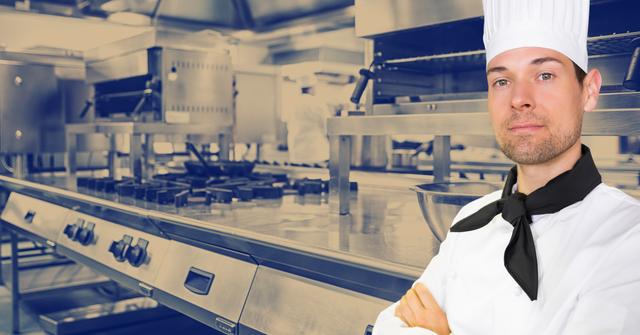 Male chef in crisp uniform standing with arms crossed in a commercial kitchen, showcasing confidence and professionalism. Ideal use for restaurant promotions, culinary schools, commercial kitchen equipment companies, and food industry advertisements. Highlights clean and structured kitchen environment.