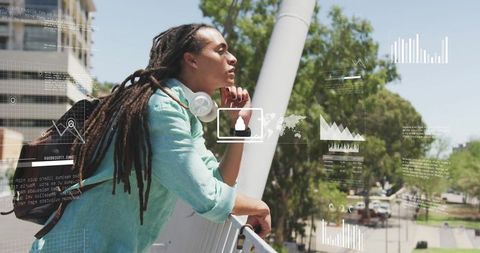 Modern Analyst Monitoring Data on Urban Balcony in Cityscape
