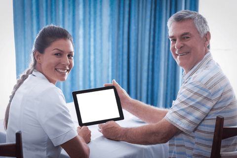 Senior Man and Nurse Displaying Tablet with Transparent Screen