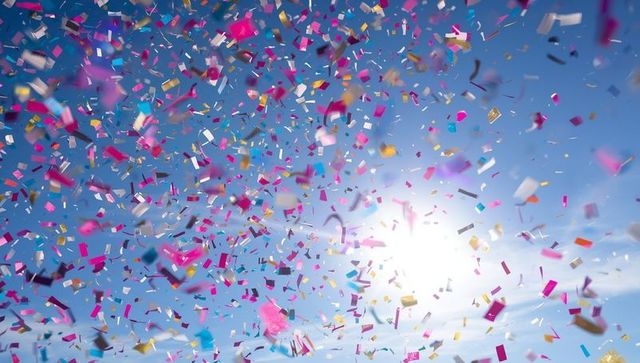 Colorful Confetti Under Bright Sky With Sunlight