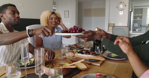 Lively Friends Sharing Brunch and Bubbly Drinks at Home