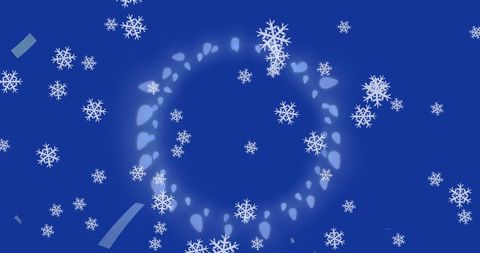 Festive Snowflakes Swirling over Blue Holiday Backdrop