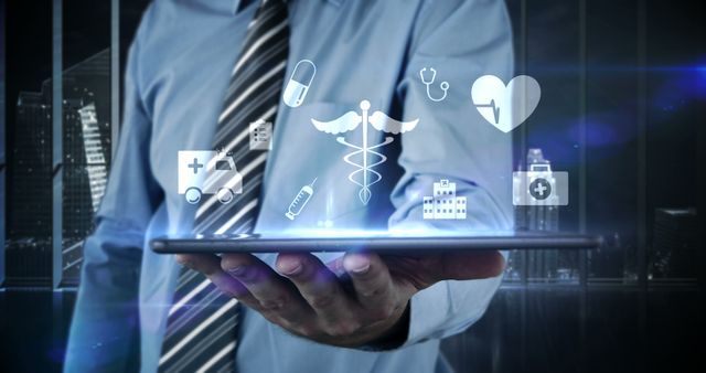 Businessman Holding Tablet with Digital Healthcare Icons - Download Free Stock Images Pikwizard.com