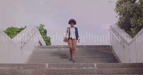 Confident Businesswoman Walking with Digital Analytics Overlay