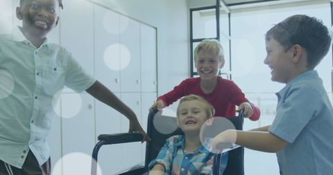 Diverse Friends Smiling with Boy in Wheelchair in School Hallway - Download Free Stock Images Pikwizard.com