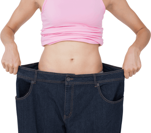 transparent concept of weight loss showing woman holding oversized jeans - Download Free Stock Videos Pikwizard.com