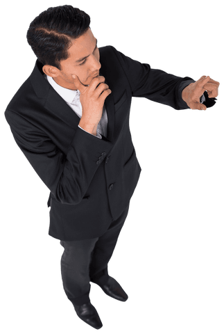 Pensive asian businessman looking thoughtful on transparent background