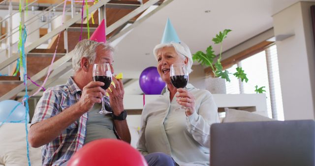 Happy Senior Couple Enjoying Birthday Celebration at Home - Download Free Stock Images Pikwizard.com