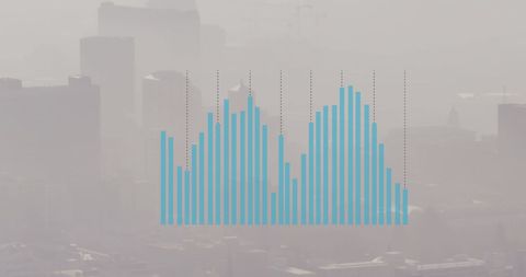 Cityscape with Graph Overlay Signifying Economic Data Analysis