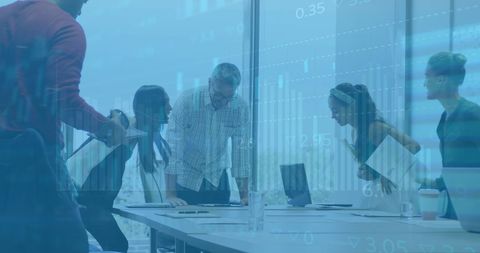 Financial data overlay on diverse business team in conference room