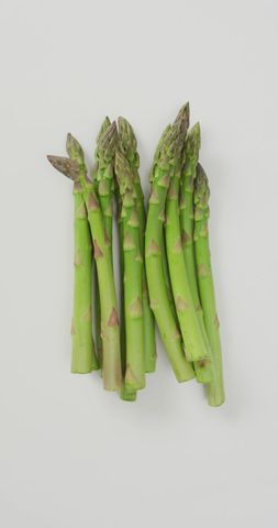 Bunch of Fresh Green Asparagus on White Background - Download Free Stock Images Pikwizard.com