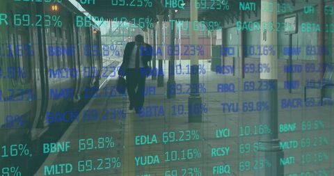 Walking commuter pulling luggage on train platform with financial ticker overlay