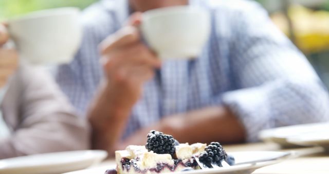 People Enjoying Coffee and Blackberry Pie at Outdoor Cafe - Download Free Stock Images Pikwizard.com