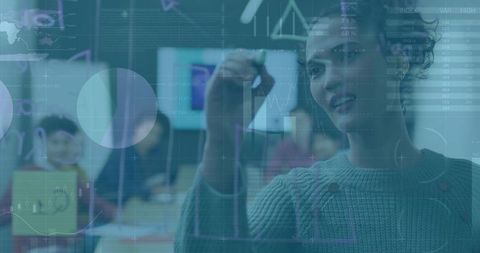 Woman Sketching Data on Glass Board During Collaborative Analytics and Dashboard Presentation