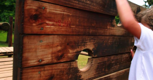 Child Playing on Wooden Playground Structure in Park - Download Free Stock Images Pikwizard.com