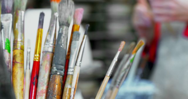 Close-up of Paintbrushes in Art Studio Creative Workspace - Download Free Stock Images Pikwizard.com