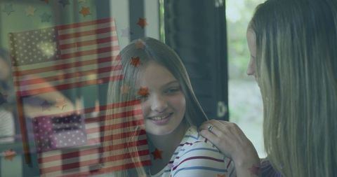 Mother-Daughter Bonding in Patriotic Kitchen Setting
