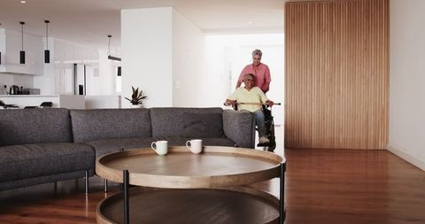 Senior Multiracial Couple Embracing Supportive Lifestyle at Home