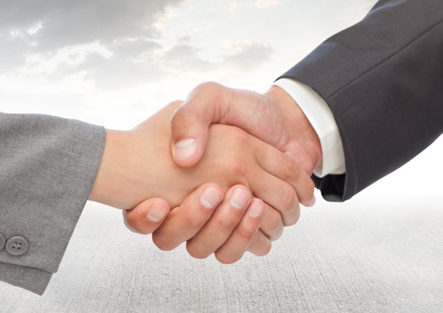 Digital composition of businessman shaking hands against sky in background