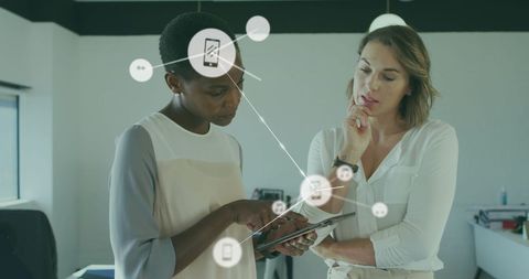 Diverse Businesswomen Collaborate Using Digital Tablet and Icons - Download Free Stock Images Pikwizard.com