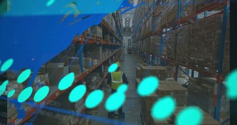 Warehouse worker using pallet jack amidst data overlay