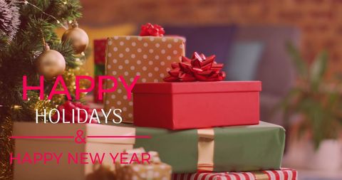 Happy holidays greeting with gift boxes under christmas tree