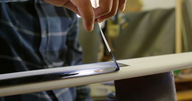 Close-Up of Person Applying Resin to Surfboard for Custom Finishing - Download Free Stock Images Pikwizard.com