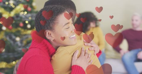 Interracial Couple Embracing in Heartfelt Holiday Hug - Download Free Stock Images Pikwizard.com